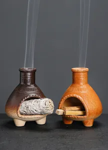 Bruciatori di incenso in ceramica a forma di camino con salvia e legno palo santo