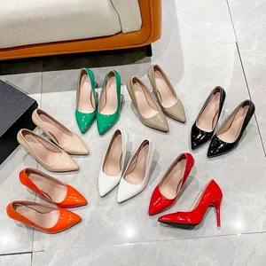 Elegant pointed toe patent leather stiletto pumps available in multiple vibrant colors