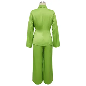 Detailed back view of lime green blazer and wide-leg trousers suit set on mannequin