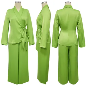 Three-view detail of the lime green satin wrap top and wide-leg trousers suit set.