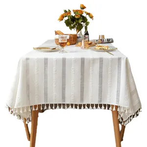 Vintage white cotton linen tablecloth with hollow-out floral patterns and tassels