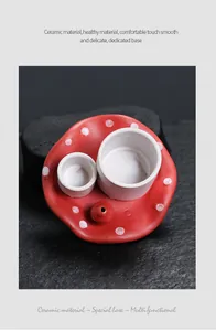 Top view of creative red mushroom ceramic incense holder tray with white cups detail.