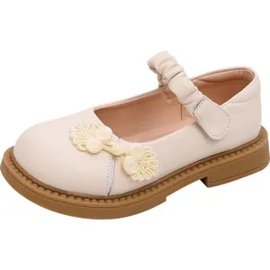 Chaussures Mary Jane rétro pour filles avec nœud chinois traditionnel en crème.