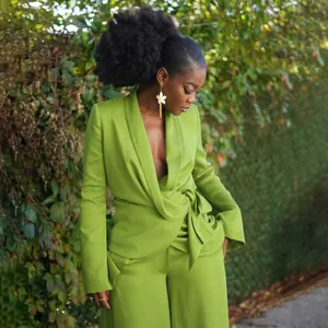 Elegant lime green two-piece suit set featuring a wrap blazer and matching wide-leg trousers