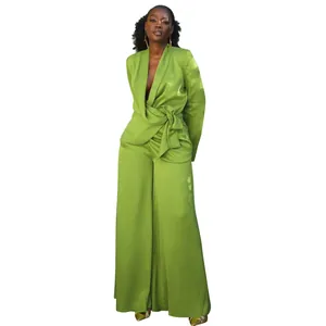 Full view of a lime green two-piece set with a wrap blazer and wide-leg trousers.