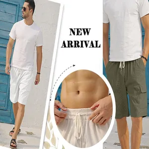 Detail view of men's corduroy cargo shorts showing drawstring waist and texture.