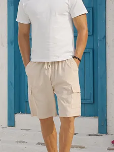 Men's casual beige corduroy cargo shorts with drawstring and side flap pockets.