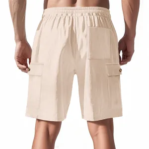 Back view detail of men's beige corduroy cargo shorts with multiple pockets and elastic waist