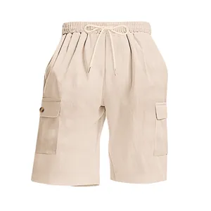 Detail of beige corduroy cargo shorts with elastic drawstring waist and pocket details.