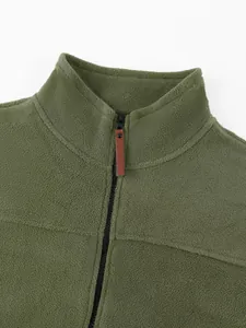 Close-up of olive green polar fleece sweatshirt with brown leather zipper pull