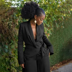 Elegant black two-piece suit with tie-waist blazer and wide-leg pants for women