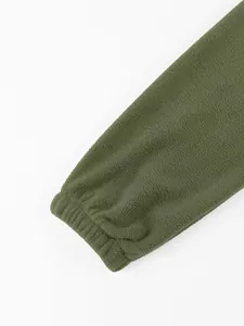 Close-up of elasticated cuff on olive green polar fleece men's sweatshirt