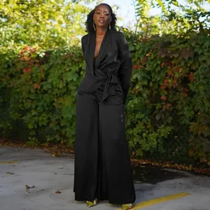 Elegant black satin wrap blazer and matching wide-leg trousers set for modern women