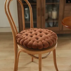 Cozy brown plush biscuit-shaped seat cushion presented on a classic wooden dining chair