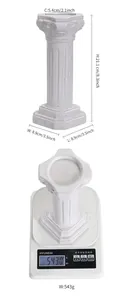 Measurement detail of the white ceramic Roman pillar candle holder showing height and weight.