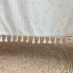 Elegant white fabric door curtain featuring orange flower embroidery and tassel trim