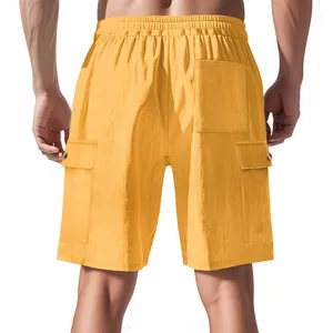 Detailed back view of men's yellow corduroy cargo shorts with functional pockets