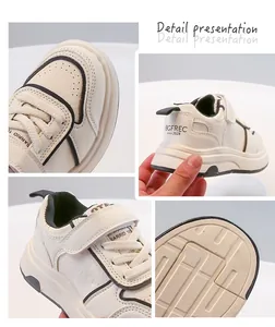 Dettagli ravvicinati scarpe casual bianche per bambini con suola e cinturino in velcro