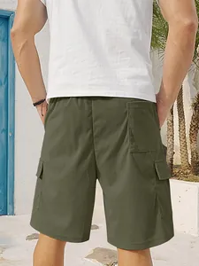 Back view of men's olive corduroy cargo shorts showing multi-pocket detail and texture.