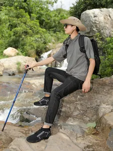Breathable outdoor wading shoes for men and women shown in a natural mountain stream setting