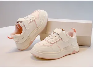 Eleganti sneaker per bambini bianche e rosa con comoda chiusura a strappo per la scuola