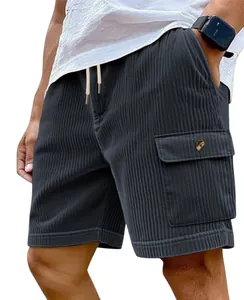 Close-up of men's dark corduroy cargo shorts with drawstring and button pocket
