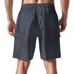 Detailed back view of men's grey corduroy cargo shorts showing multi-pocket design
