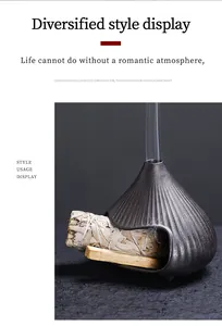 Artistic ceramic Fuji incense burner with cedar and sage bundles, smoky atmosphere
