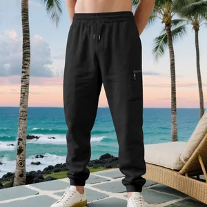 Black heavy cotton cargo sweatpants with drawstring waist and zipper pocket detail