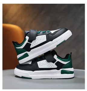 Children's casual sneakers in black white green with Velcro closure and leather finish