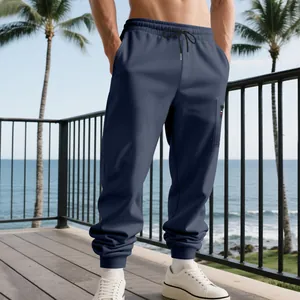 Detailed view of navy blue heavy cargo joggers for men with side pocket and drawstring
