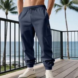 Close-up detail view of navy blue men's heavy cargo sweatpants with side zipper pocket