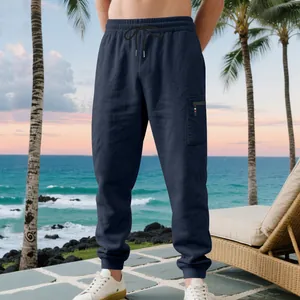 Heavyweight men's navy blue cargo joggers with drawstring waist and ribbed cuffs.
