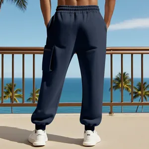Back view of heavy navy blue men's cargo sweatpants with jogger cuffs and side pocket