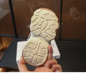 Detailed view of non-slip rubber sole for children's chunky sports sneakers