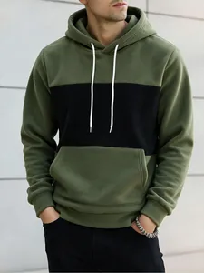 Detailed close-up of men's olive green and black color block fleece hoodie.