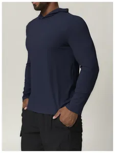 Close-up of men's navy blue quick-dry hooded long-sleeve shirt showing fit and fabric