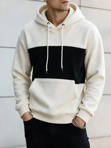 Front view of men's color-block hooded sweatshirt with kangaroo pocket detail in cream