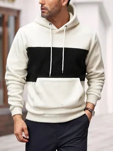 Detail view of men's color-block fleece hoodie showing soft texture and functional pocket