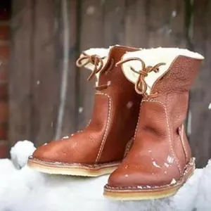 Premium handmade brown leather snow boots with warm fleece lining and lace-up design for winter
