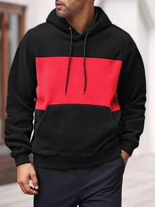 Detail of men's color-block fleece hoodie with red chest panel and drawstring.