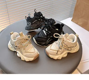 Detailed view of breathable children's sneakers in black and beige color options.