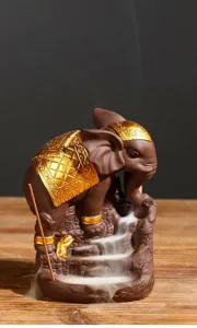 Detailed view of a purple sand elephant backflow incense burner for home zen decor