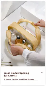 Detailed view of large yellow toiletry bag with wide double-zipper opening for travel.