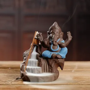 Handcrafted Ganesha purple clay backflow incense burner with smoky waterfall effect