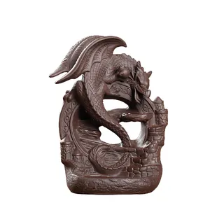 Handcrafted ceramic backflow incense burner featuring a flying dragon on a castle tower