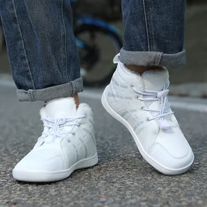 Children's white plush-lined snow boots with warm thermal design and non-slip sole