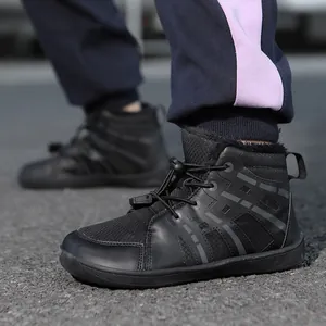 Warm children's black snow boots with thickened faux fur lining and durable rubber soles