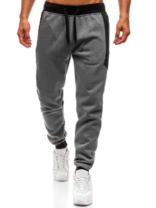 Grijze slim fit heren joggingbroek met zwarte zijpanelen en een handig trekkoord in de taille