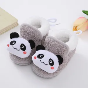Detail of cute panda face design on warm fleece-lined baby winter booties